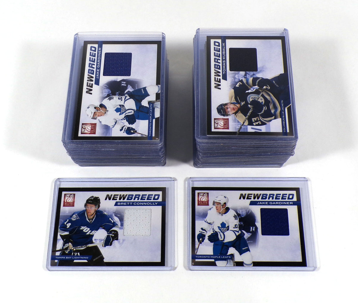 Lot of (36) Assorted 2012-13 Panini Donruss Elite New Breed Hockey Jersey Cards