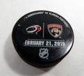 Florida Panthers Vs Carolina Hurricanes Game Used Black Warm Up Puck DP61325