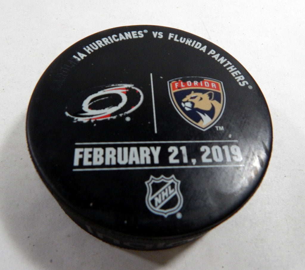 Florida Panthers Vs Carolina Hurricanes Game Used Black Warm Up Puck 331