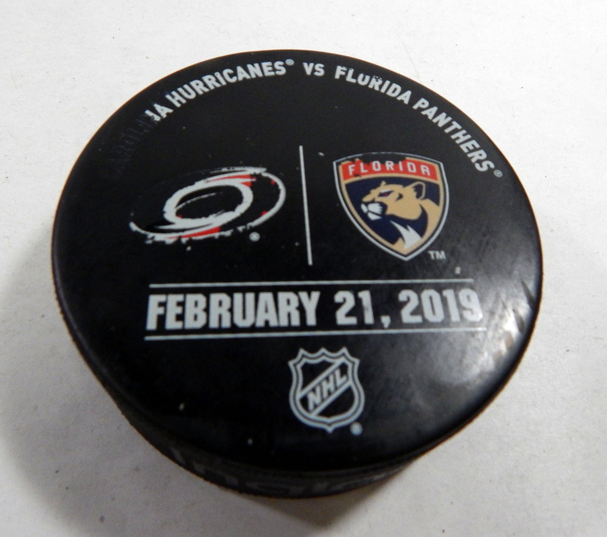 Florida Panthers Vs Carolina Hurricanes Game Used Black Warm Up Puck 331