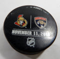 Florida Panthers Vs. Ottawa Senators Game Used Black Warm Up Puck DP61341