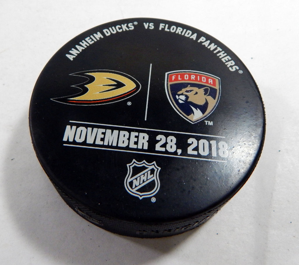 Florida Panthers Vs. Anaheim Ducks Game Used Black Warm Up Puck DP61343
