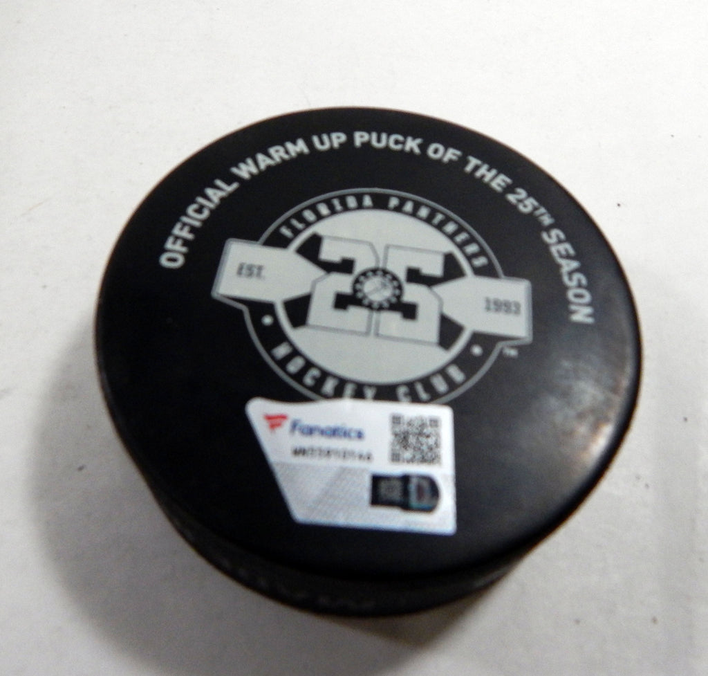 Florida Panthers Vs. Carolina Hurricanes Game Used Black Warm Up Puck DP61344 Pic2