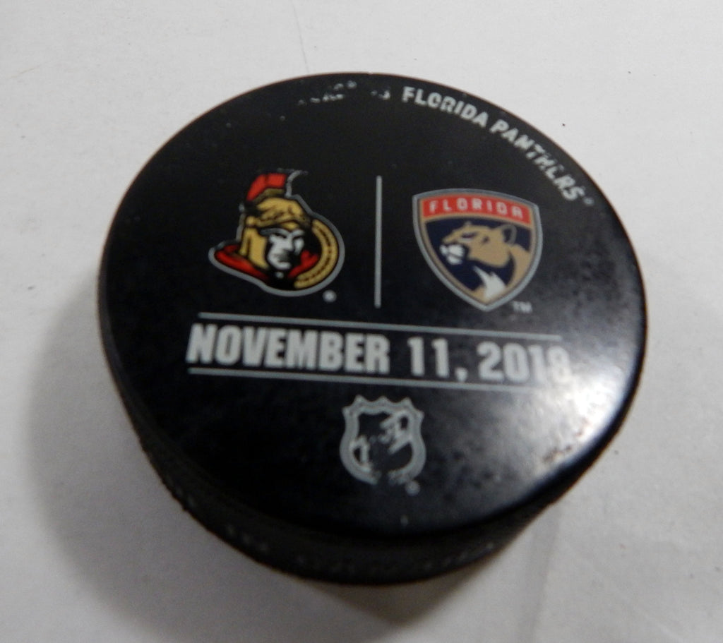 Florida Panthers Vs. Ottowa Senators Game Used Black Warm Up Puck DP61346