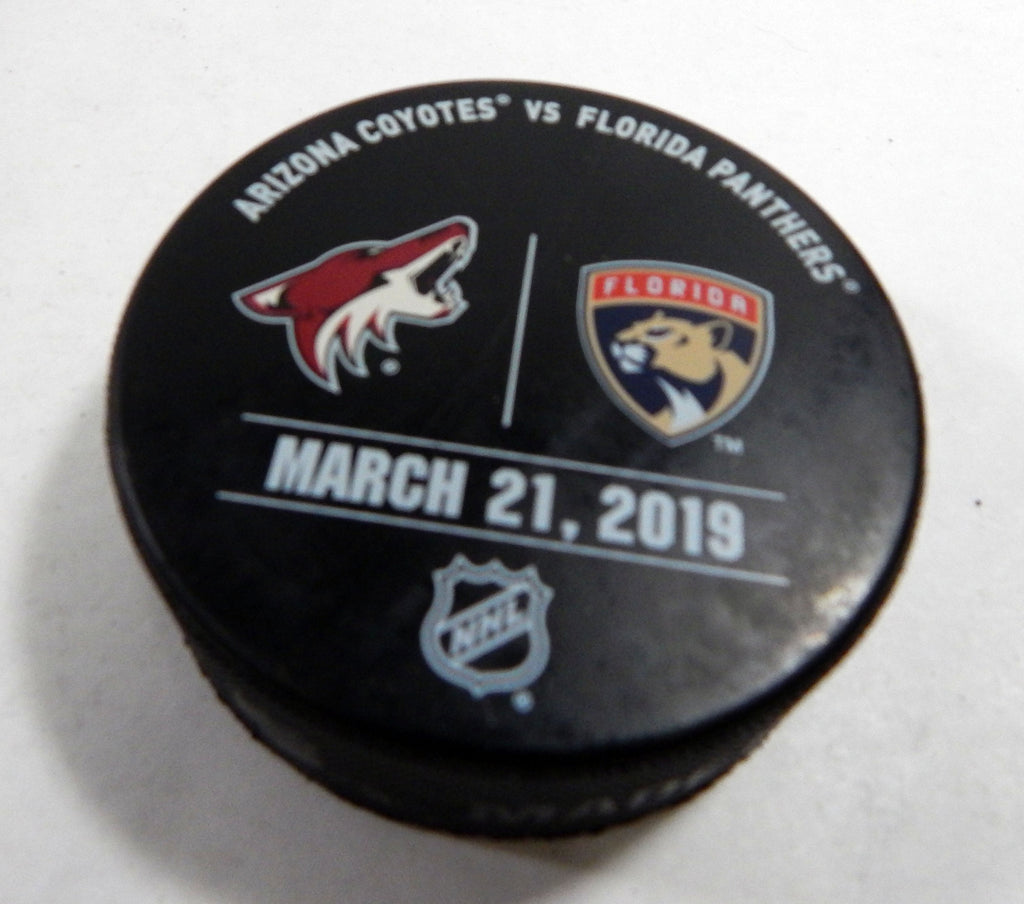 Florida Panthers Vs Arizona Coyotes Game Used Black Warm Up Puck DP61354