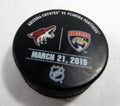 Florida Panthers Vs Arizona Coyotes Game Used Black Warm Up Puck DP61354