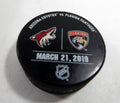 Florida Panthers Vs Arizona Coyotes Game Used Black Warm Up Puck DP61359