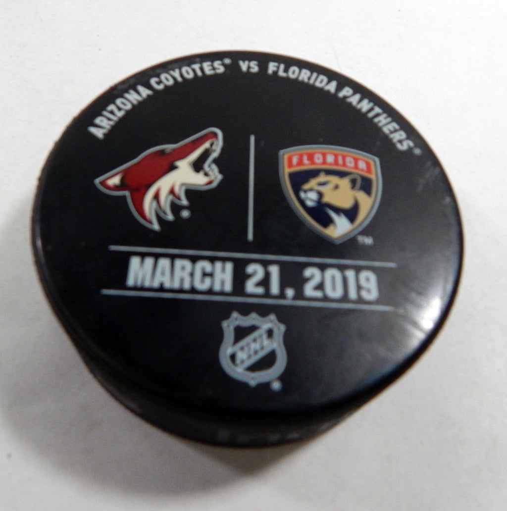 Florida Panthers Vs Arizona Coyotes Game Used Black Warm Up Puck DP61373