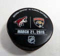 Florida Panthers Vs Arizona Coyotes # Game Used Black Warm Up Puck DP61385