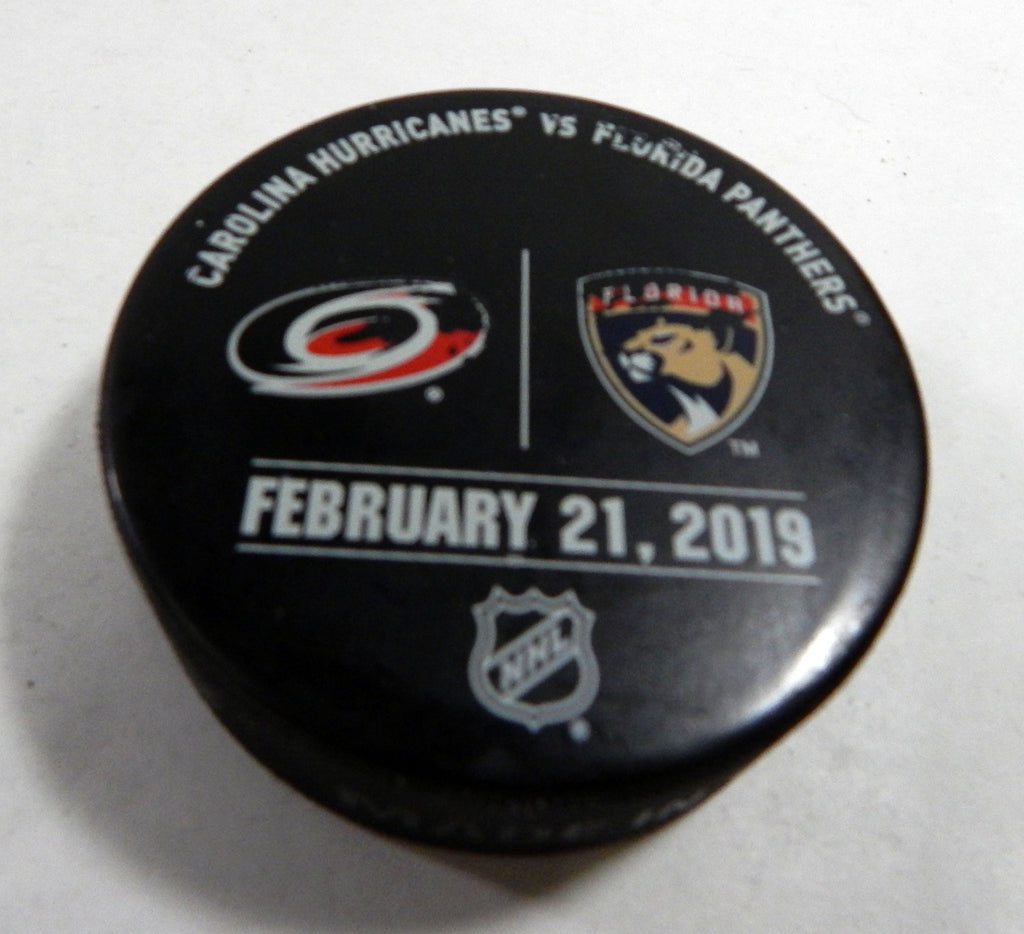 Florida Panthers Vs. Carolina Hurricanes Game Used Black Warm Up Puck DP61387