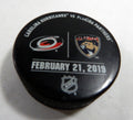 Florida Panthers Vs. Carolina Hurricanes Game Used Black Warm Up Puck DP61387