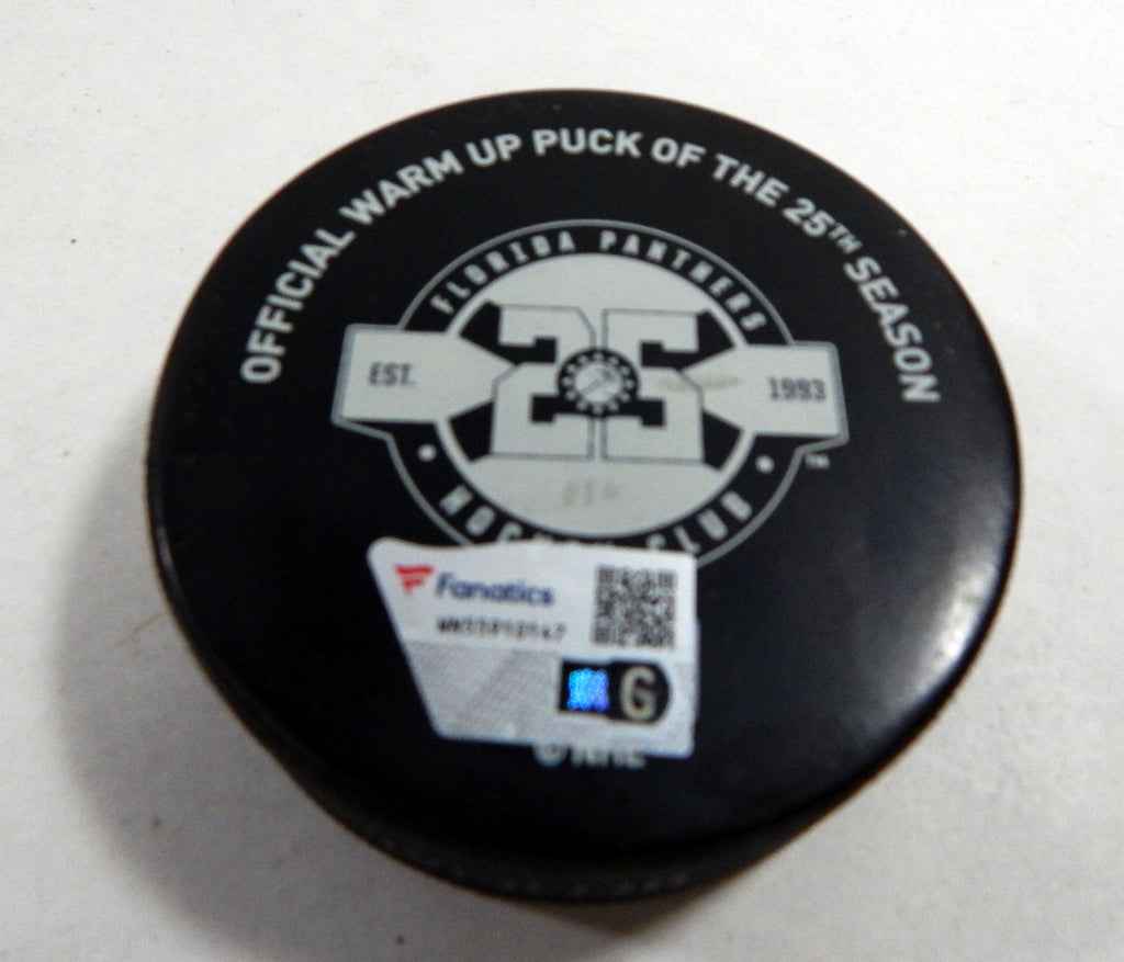 Florida Panthers Vs. Carolina HurricanesGame Used Black Warm Up Puck DP61388 Pic2