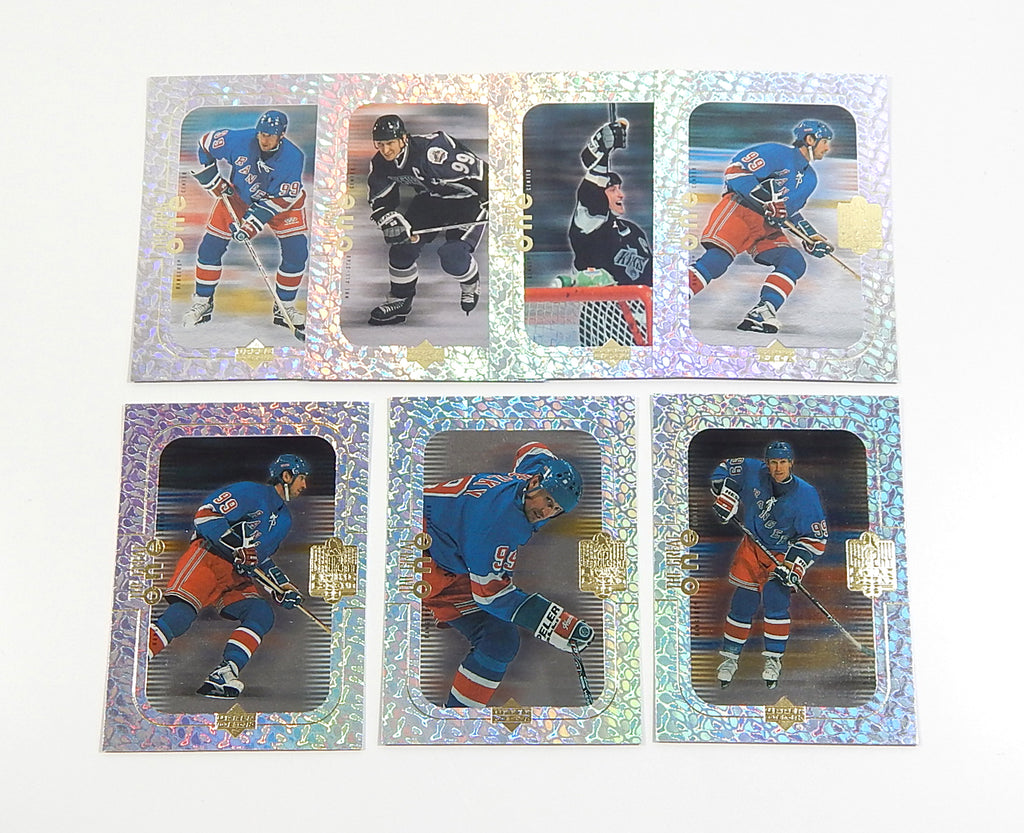 Lot of (7) 1999 Upper Deck Wayne Gretzky Living Legend The Great One Inserts