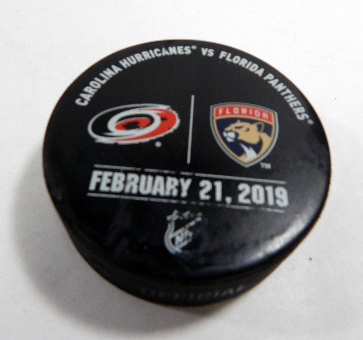 Florida Panthers Vs. Carolina Hurricanes Game Used Black Warm Up Puck DP61353 - DP61353